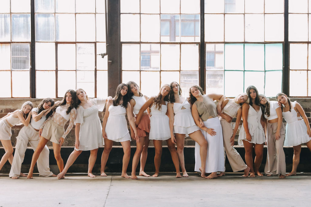 a group photo of dancers